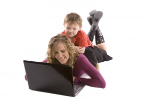 http://www.dreamstime.com/stock-photography-mom-son-working-image14358692